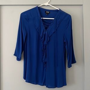 Blue blouse with ruffles and tie front, size small